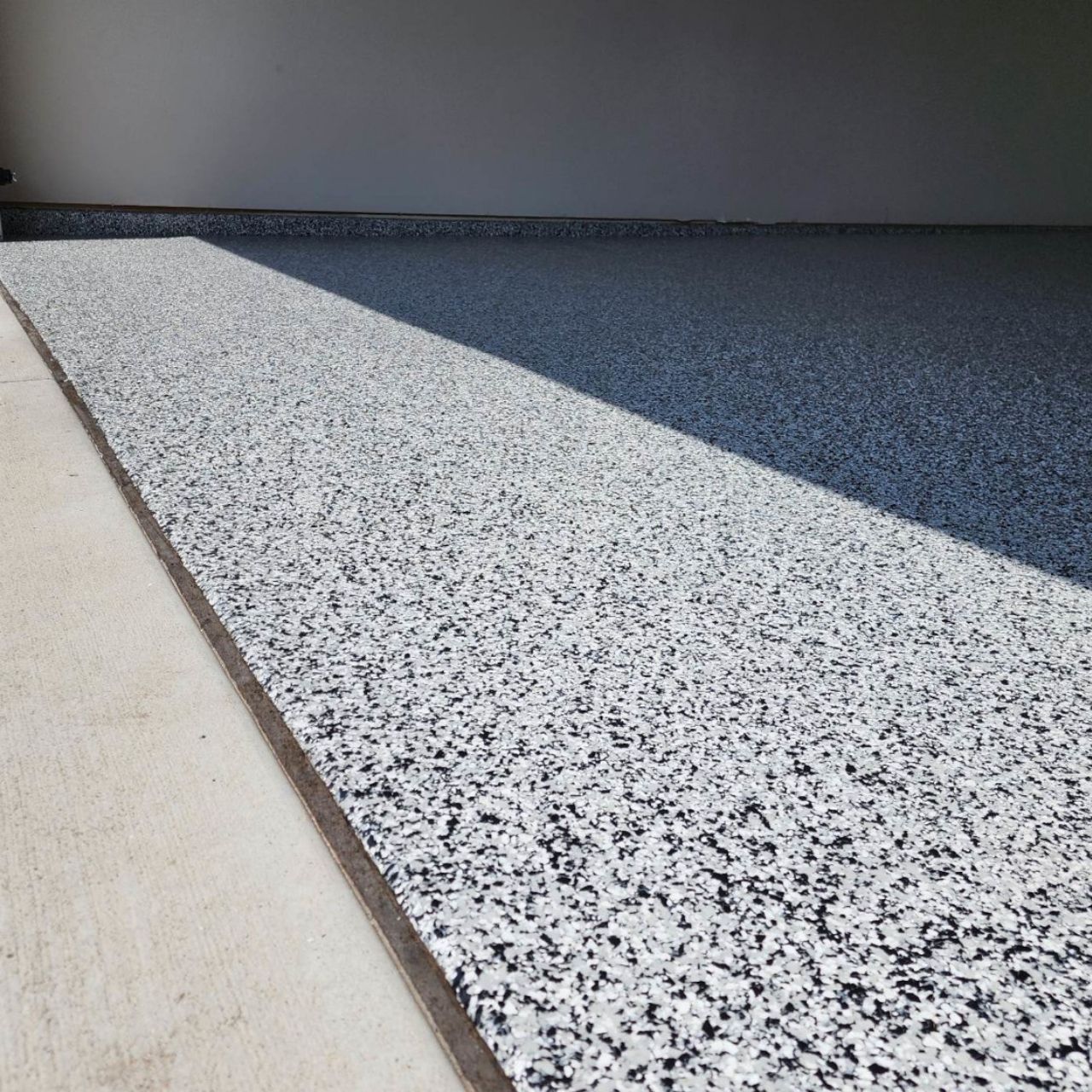 DIY epoxy kit vs professional floor coating