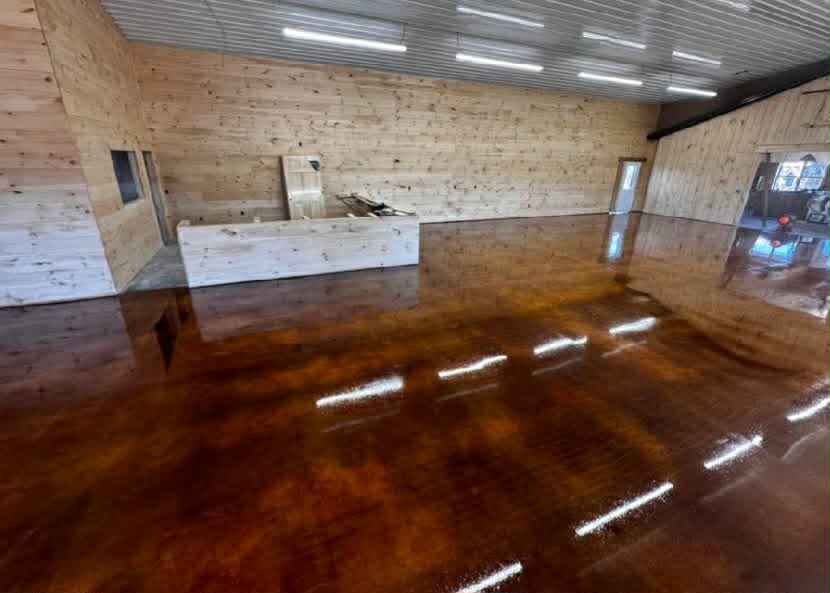Acid stained concrete shop floor Osage Beach MO β Shipp-Mates Epoxy of the Ozarks